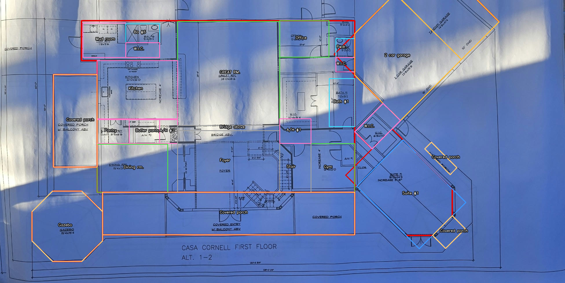 The photographed first floor plan
    with every retraced room drawn over it in colored outline and labeled: mud room, kitchen, pantry, butler
    pantry, dining room, foyer, stair, gym, great room, office, powder, bath 1, suite 1, two car garage, tandem
    garage, gazebo and five covered porches. Each outline sits on the walls printed underneath it.